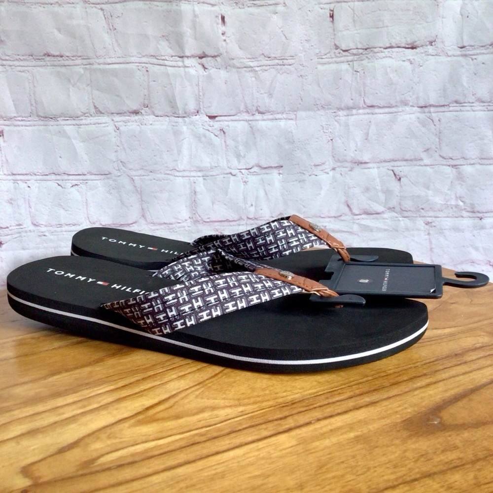 Tommy Hilfiger Black and White Flip Flop Sandals with Modern Design - Size 10